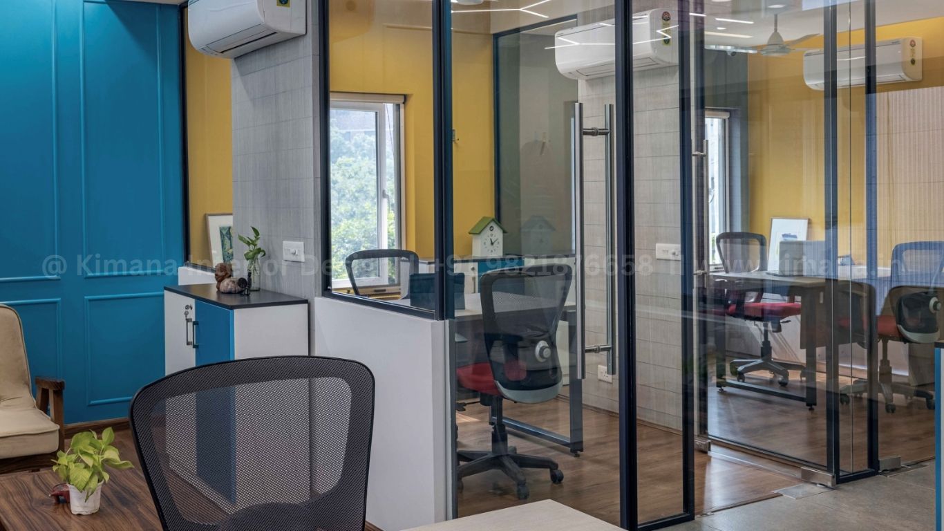Commercial office workspace interior with modern furniture and lighting